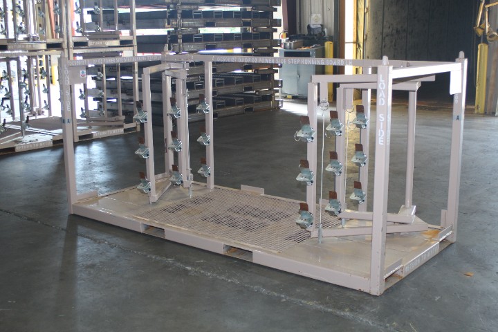 Tan steel rack with mounted fixtures and a load side label