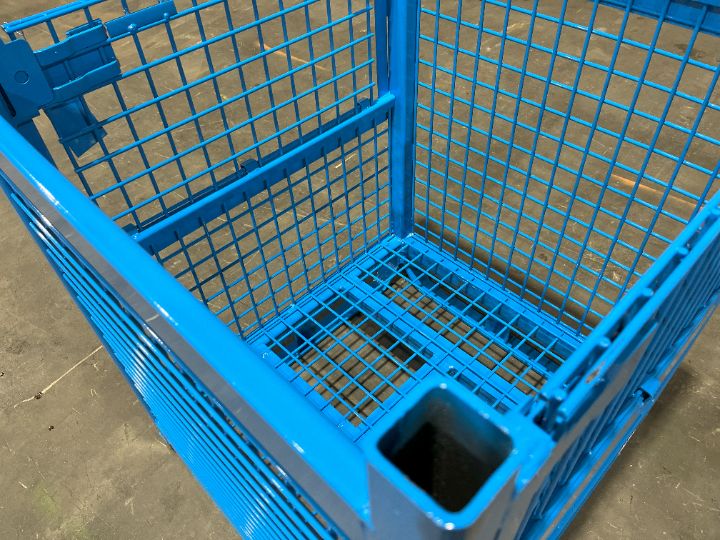 Close-up of a blue mesh steel container