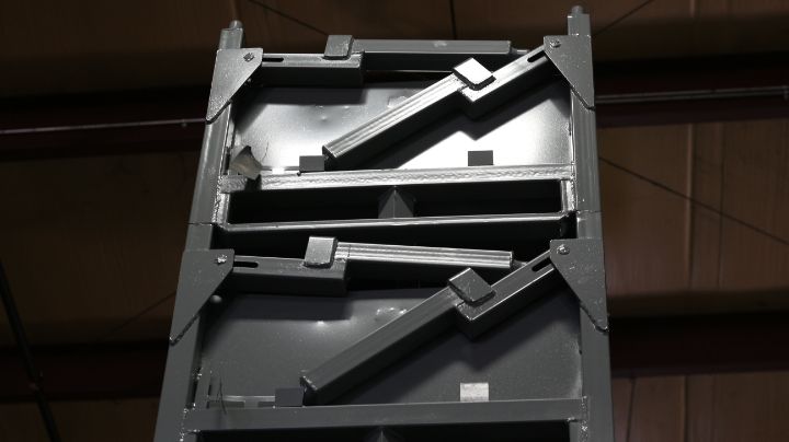 Custom folding-arm industrial metal containers engineered for collapsible empty return and returnable shipping duty.