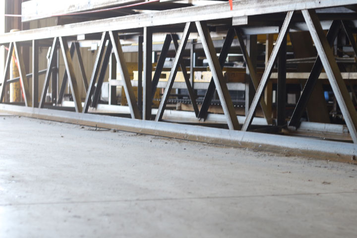 Custom industrial steel structural assembly engineered for load-bearing platforms and facility integration.