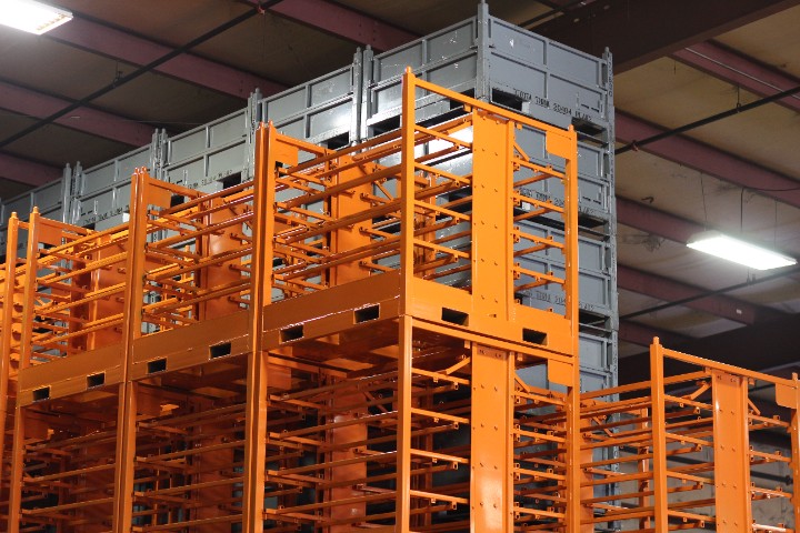 Orange and grey metal racks and bins
