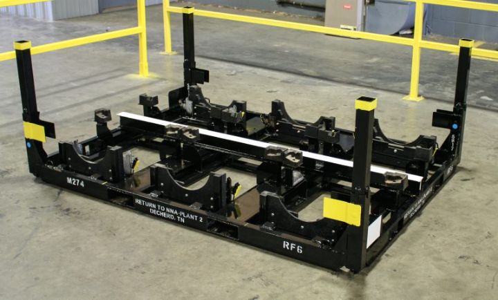 Custom steel transmission rack built by Morrison Industries for automotive OEM shipping and assembly line delivery.