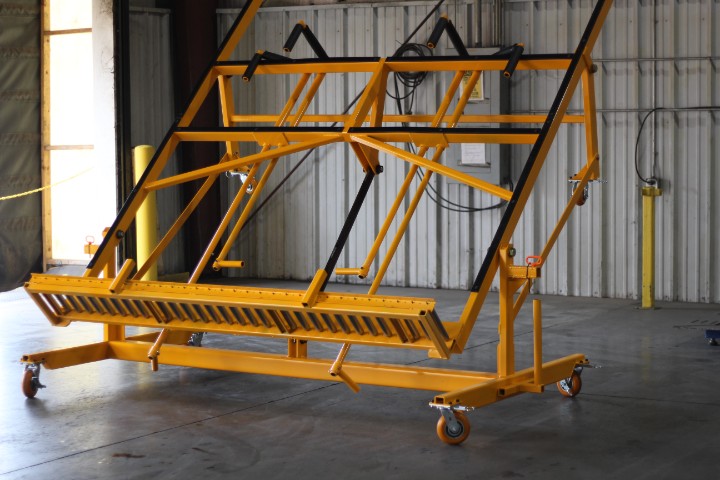 Yellow custom industrial cart built for heavy-duty material handling on the shop floor.